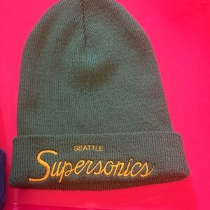 Mitchell & Ness Dark Green Beanie with Orange Logo